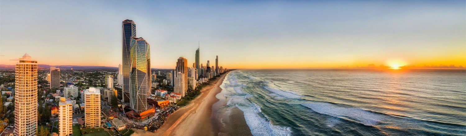 Gold Coast beachfront skyline at sunset.